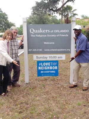 Finding Quakers. Orlando Friends Meeting Sign with three people.